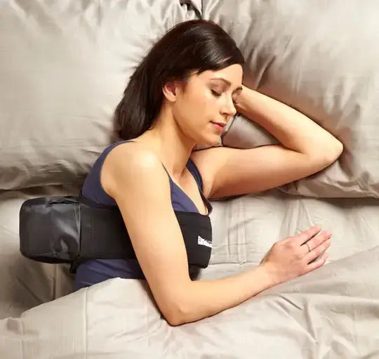 Female experiencing restful sleep on her side with Rematee's premium side-sleeping solution.